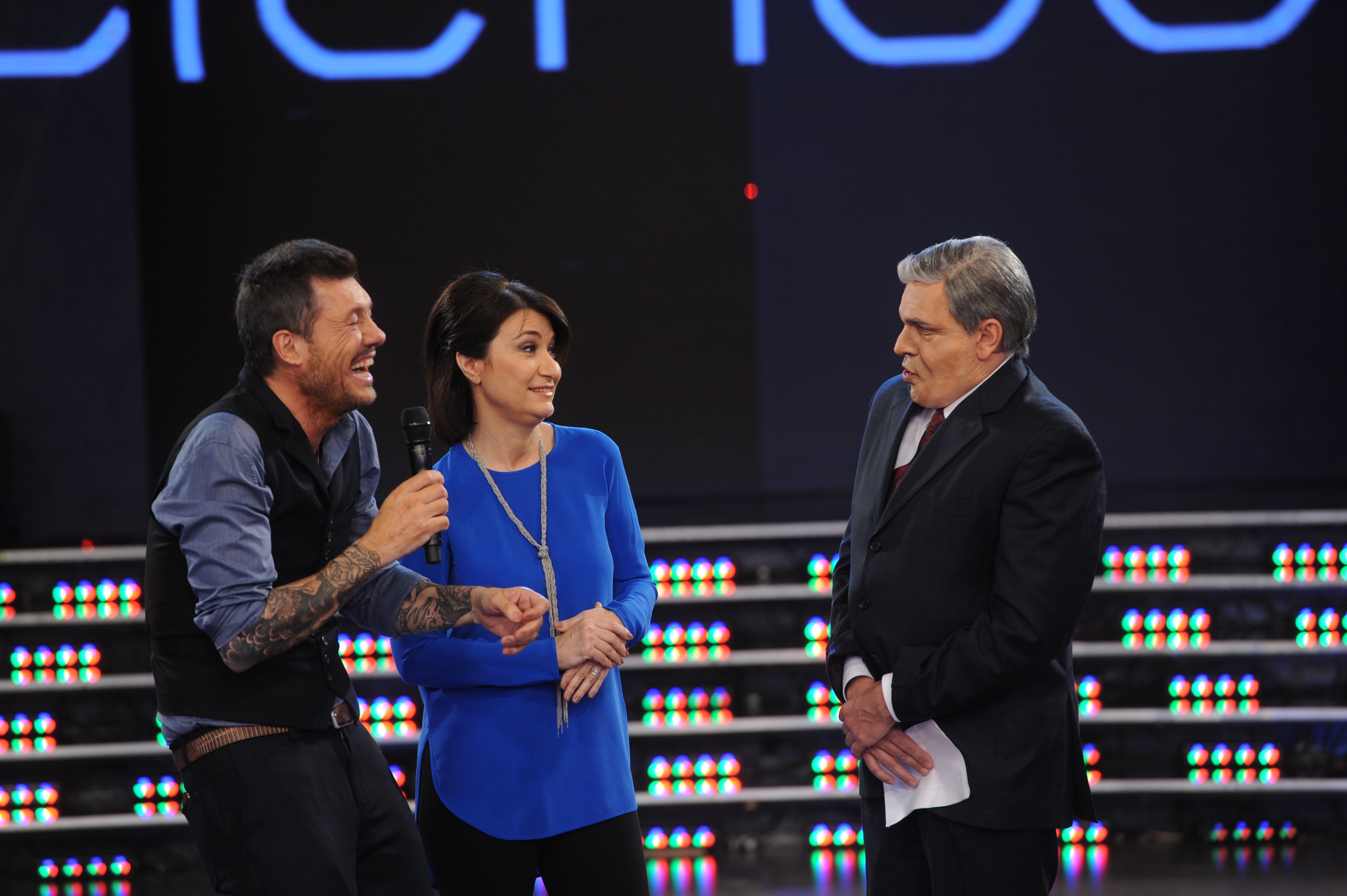 MT, Maria Laura Santillán y Freddy como Santo